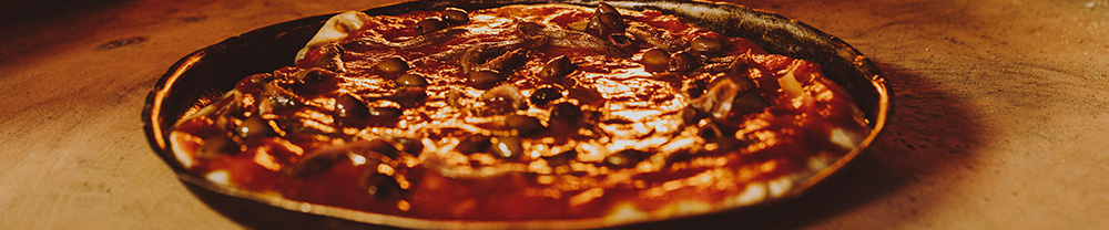 Pizza all'Andrea prodotto tipico di Imperia
 